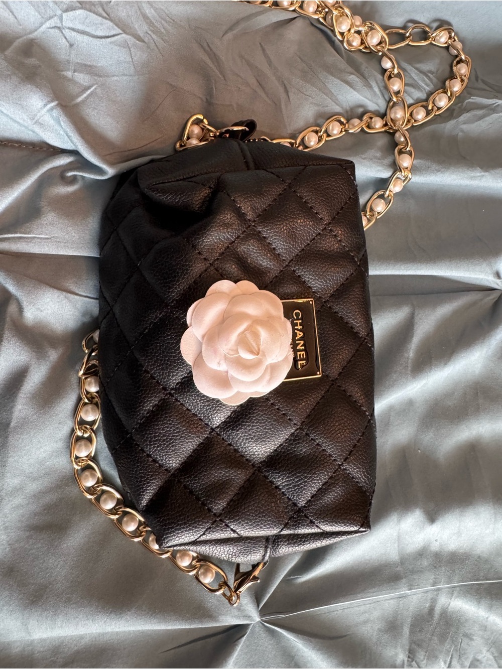 CHANEL Black Quilted Leather Crossbody with Pale Pink Camellia